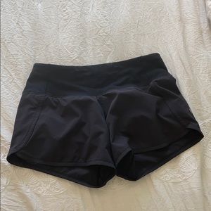 Women’s black lululemon speed up 4” shorts